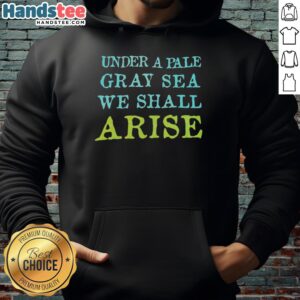 Premium Under A Pale Gray Sea We Shall Arise Hoodie displayed on a wooden background, showcasing its stylish design and comfort.