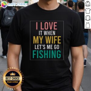 Official Fishing Quote T-Shirt: 'I Love When Wife Lets Me' design for fishing enthusiasts and loving husbands.