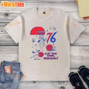 Original Philadelphia 76ers X Snoopy and Woodstock 'Clap Your Hands' T-Shirt featuring vibrant graphics.