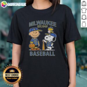 Pretty Charlie Brown and Snoopy Milwaukee Brewers basketball tee for ladies, established 1969, featuring colorful design.