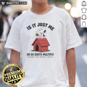 Funny Snoopy T-shirt featuring 'Do Idiots Multiply Quicker?' slogan, perfect for humor lovers and quirky fashion fans.