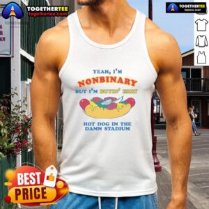 Nonbinary individual wearing a tank top at a stadium, enjoying hot dogs with confidence and style.