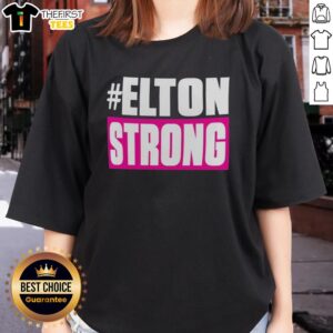 Official Elton Strong Ladies Tee featuring a stylish design and vibrant colors, perfect for fans and everyday wear.