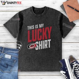 Alt Text: Man wearing a Hot Carolina Hurricanes This Is My Lucky Washed T-Shirt, showcasing team spirit and style.