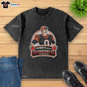 Official football with strawberry ice design on a washed t-shirt, showcasing a unique and trendy sports apparel style.