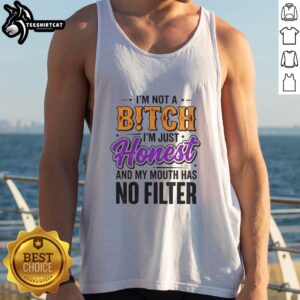 Model wearing 'Nice I'm Not A Bitch I'm Just Honest' tank top with a bold design and casual style.