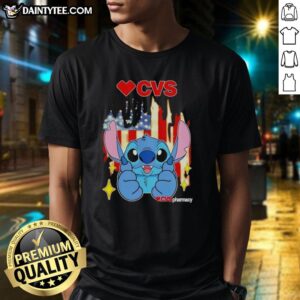 Alt Text: Cute Stitch-like CVS Pharmacy USA flag t-shirt featuring vibrant colors and a playful design, perfect for casual wear.
