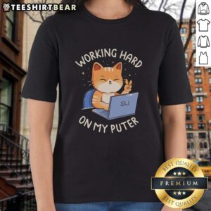 Lady focused on computer work wearing a stylish 'Good Working Hard On My Puter' tee shirt, perfect for tech enthusiasts.