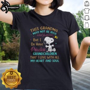 Premium Snoopy tee for grandmas features 'This Grandma May Not Be Rich And Famous But I Do Have Priceless' design.