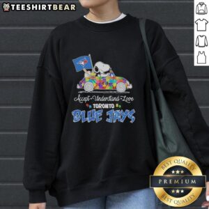 Cute Snoopy and Woodstock driving a car on a Toronto Blue Jays sweatshirt promoting autism acceptance and love.