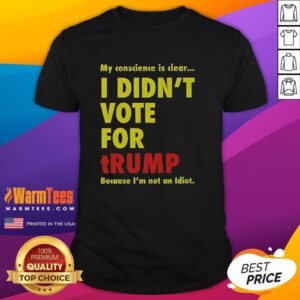 Good My Conscience Is Clear I Didn't Vote For Trump T-Shirt featuring bold text on a casual shirt, perfect for political expression.
