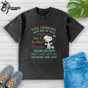 Alt Text: Premium Snoopy t-shirt featuring the phrase This Grandma May Not Be Rich and Famous But I Do Have Priceless design.