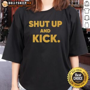 Harrison Butker of the Kansas City Chiefs in a 'Shut Up and Kick' ladies tee, showcasing team spirit and style.