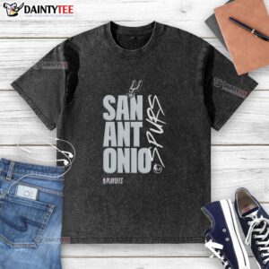 Alt Text: Official San Antonio Spurs playoff logo washed t-shirt featuring a vintage design in team colors. Perfect for fans!