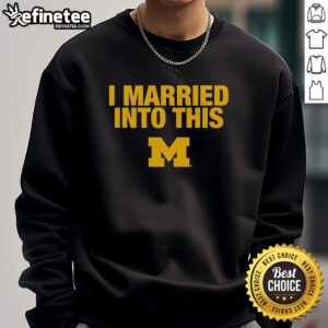 Official I Married Into This Michigan Wolverines Sweatshirt in navy blue, perfect for loyal Wolverines fans and alumni.
