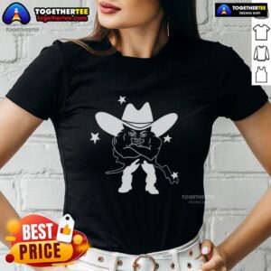 Alt Text: Awesome medium build weird guy in a cowboy hat wearing a stylish ladies tee, showcasing a unique fashion statement.