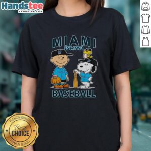 Good Charlie Brown, Snoopy, and Woodstock in Miami Marlins baseball jersey, Est. 1993, featured on a ladies tee.