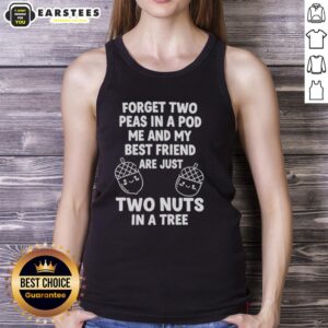 Two friends wearing matching 'Two Nuts in a Tree' tank tops, enjoying a fun moment together under a tree.