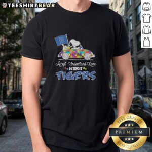 Alt Text: Pretty Snoopy and Woodstock driving a car on a Detroit Tigers T-shirt promoting autism acceptance and love.