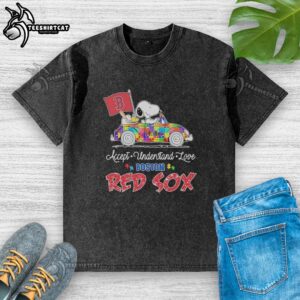 Alt Text: Snoopy and Woodstock driving a car on a Boston Red Sox t-shirt, promoting autism acceptance and love.