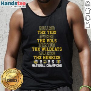 Premium Michigan Wolverines tank top featuring 2026 design celebrating victories over Tide, Vols, Wildcats, and Huskies.