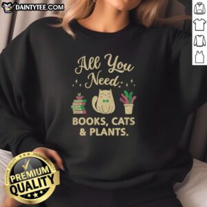 Alt Text: Cozy sweatshirt featuring 'Nice All You Need' design with books, cats, and plants, perfect for book lovers and cat enthusiasts.