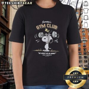 Pretty Snoopy's Gym Club 'Go Heavy or Go Home' Riot Society ladies tee featuring a fun and stylish design.