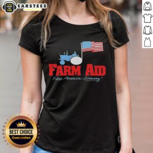 Original Farm Aid Keep America Growing logo featuring a tractor and American flag on a ladies' tee shirt.