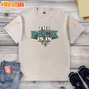 Alt Text: Hot Jacksonville Jaguars pick is in washed t-shirt featuring team logo, perfect for fans celebrating the draft.