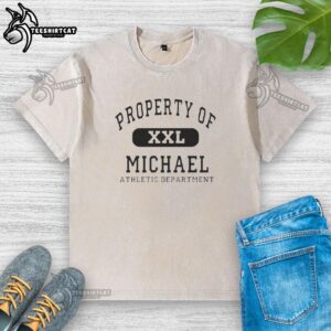 XXL Michael washed t-shirt displayed on a wooden table, showcasing its soft fabric and stylish design.