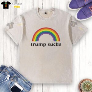 Official Trump Sucks Rainbow Funny Washed T-Shirt featuring vibrant colors and playful text for humorous fashion enthusiasts.