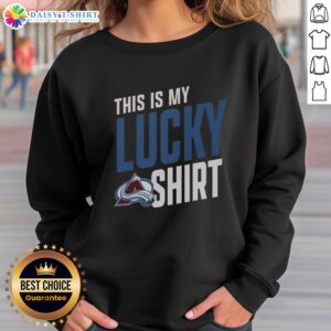 Alt Text: Person wearing a 'This Is My Lucky Sweatshirt' at a Colorado Avalanche game, showcasing team spirit and style.