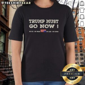 Alt Text: Ladies tee featuring 'Awesome Donald Trump Must Go Now' slogan with US flag design, promoting peace and honesty.