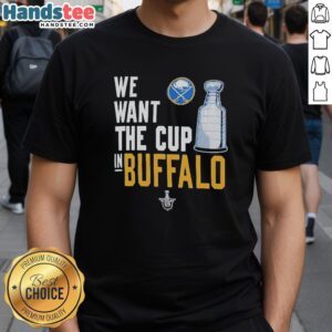 Alt Text: Buffalo Sabres logo T-shirt featuring 'We Want The Cup' slogan, perfect for fans showing team pride.