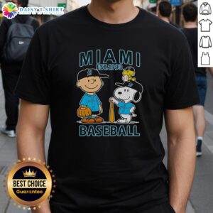 Alt Text: Charlie Brown, Snoopy, and Woodstock wearing a Miami Marlins baseball jersey on a stylish t-shirt, est. 1993.