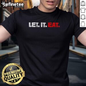 Pretty Trevor Bauer wearing a 'Let It Eat' T-shirt, showcasing his style and passion for baseball in a vibrant photo.