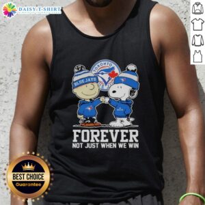 Alt Text: Charlie Brown fist pump with Snoopy in Toronto Blue Jays tank top, celebrating team spirit forever, not just during wins.