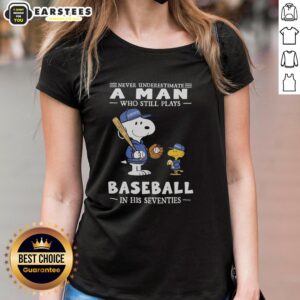 Alt Text: Cute Peanuts x Toronto Blue Jays tee for women celebrates seniors playing baseball in their seventies with style.