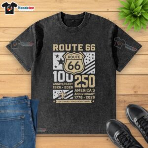 Alt Text: Premium New Orleans Saints Route 66 Centennial T-shirt celebrating 100th Anniversary (1926-2026) and America's 250th.