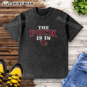 Arizona Cardinals fan in a washed t-shirt celebrating a good pick at the NFL draft event.