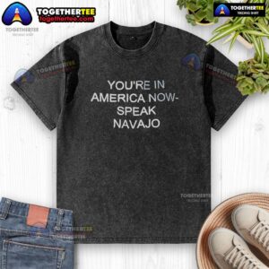 Alt Text: Official You're In America Now Speak Navajo washed t-shirt featuring a stylish design and vibrant colors.