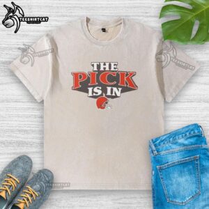 Alt Text: Awesome Cleveland Browns Pick Is In washed t-shirt featuring team colors and logo, perfect for fans on game day.