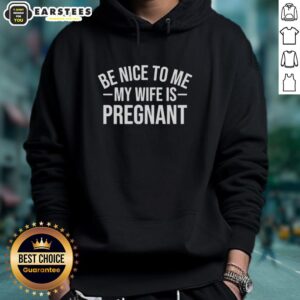 Funny hoodie featuring 'Be Nice To Me, My Wife Is Pregnant' slogan, perfect for proud dads and expecting parents.