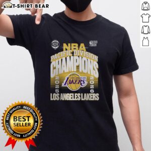 Alt Text: Good Los Angeles Lakers 2026 Pacific Division Champions T-Shirt displayed in a locker room setting.