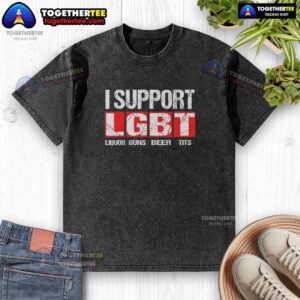 Alt Text: Nice I Support LGBT Liberty Guns Beer Tits Letter Graphic on Washed T-Shirt, promoting freedom and pride.