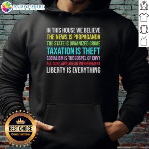 Alt Text: Awesome 'In This House We Believe' Libertarian Version Hoodie showcasing bold text design and cozy fabric.