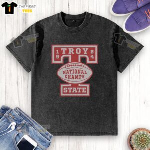 Alt Text: Vintage Top Troy State Football 1984 National Champions washed t-shirt displayed on a wooden background.