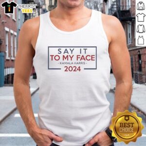 Alt Text: Retro tank top featuring Say It To My Face slogan with Kamala Harris design for 2024 election supporters.