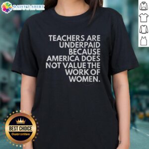 Top teachers are underpaid, highlighting America's undervaluation of women's work on a ladies' tee shirt design.
