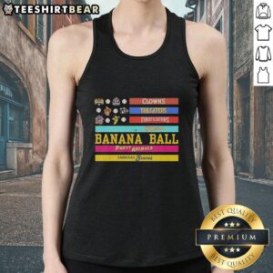 Good Savannah Bananas clowns and firefighters tailgating in American flag tank tops at a lively baseball game.